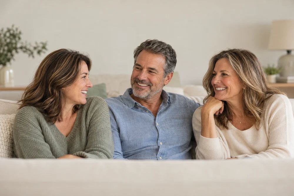 Illustrative portrait of three elderly friends talking together.